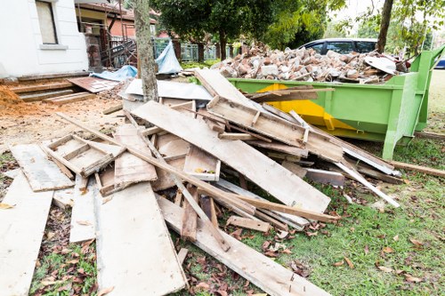 Construction site with skip bin in Chiswick