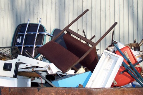 Professional team handling demolition debris in Chiswick
